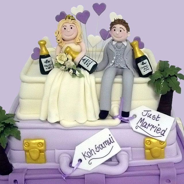 A novelty wedding cake made to the customers instructions
